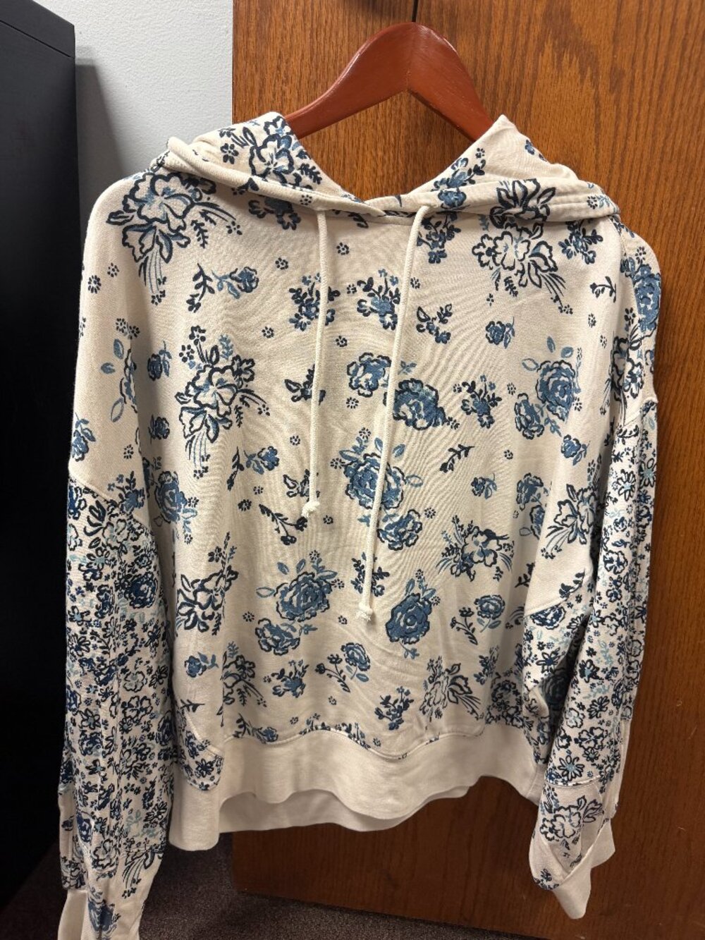 White Sweater with Blue Floral Accent